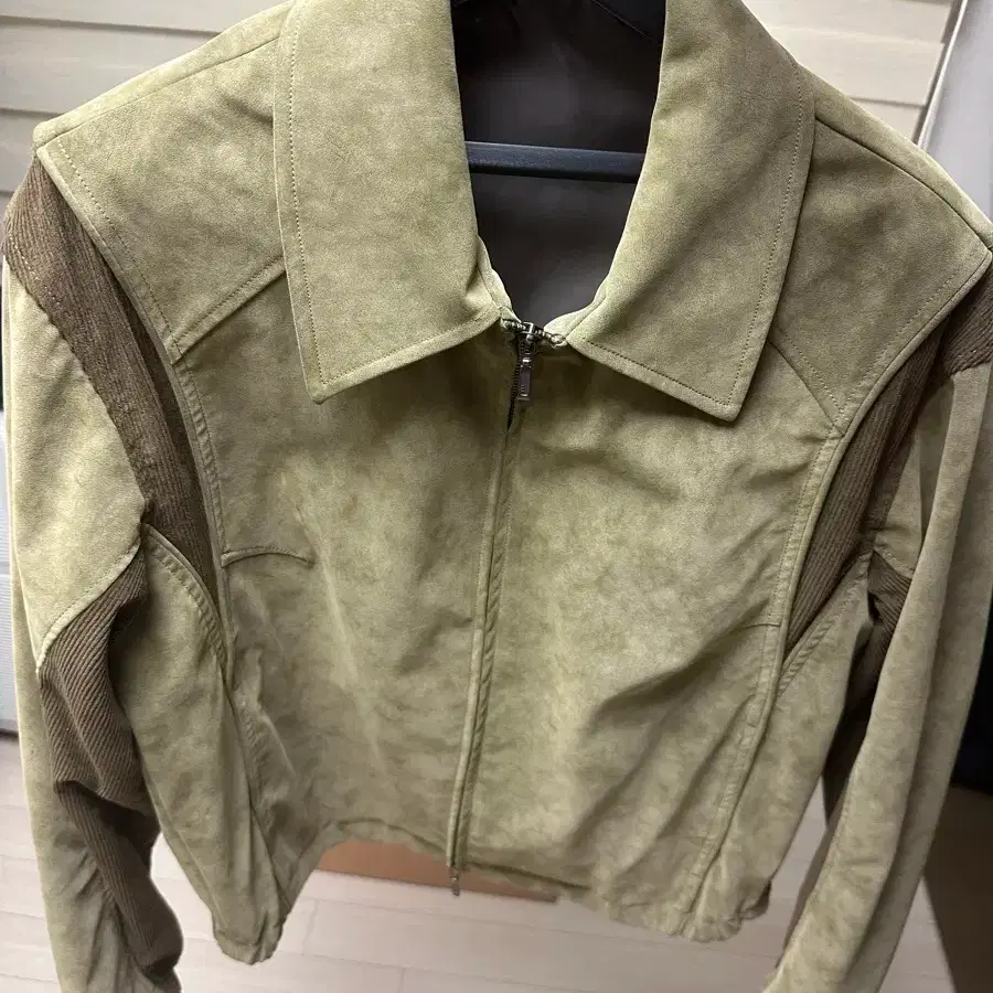 COOR | 쿠어 Coor Mixed Suede Piping Jumper on Bunjang Global Site.