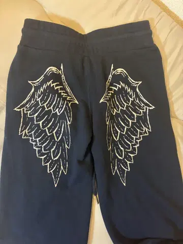9090girl cross logo