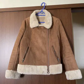 브라운 무스탕 코트 지퍼 포함