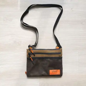 UNIVERSAL OVERALL 사코슈 브라운/오렌지