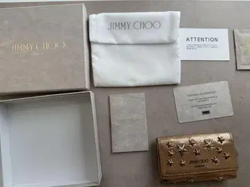 JIMMY CHOO 골드 키케이스 별 모양 스터드 부착