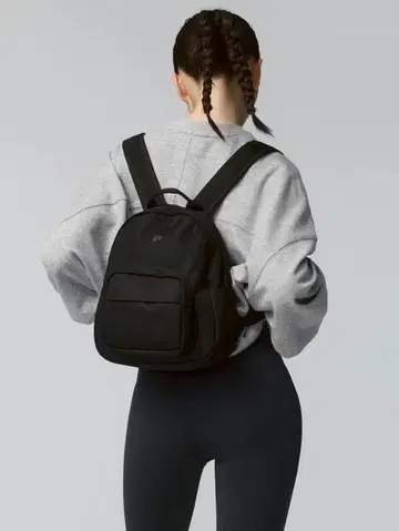 젝시믹스 심볼 로고 컴팩트 백팩 블랙