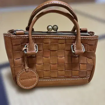 주케로 필라토 숄더백 가마구치 백