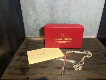LARRY SMITH TRIANGLE CROSS PENDANT