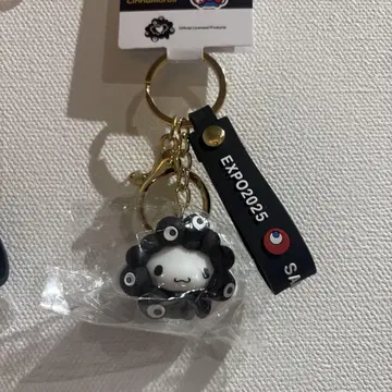 간사이 엑스포 미야쿠미야쿠 산리오 키링 블랙 변신 시나몬 롤