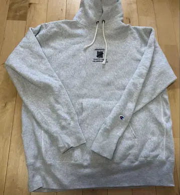 UNDEFEATED x champion 그레이 후드티