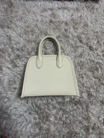 아이보리 미니 핸드백 합성 피혁