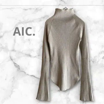 AIC. 플레어 슬리브 상의