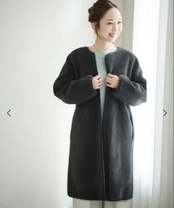 le.coeur blanc 리버서블 페이크 무스탕 코트 38 사이즈