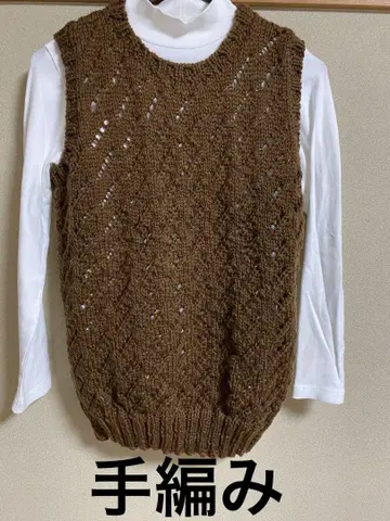 브라운 니트 베스트 꽈배기 무늬 슬리브리스