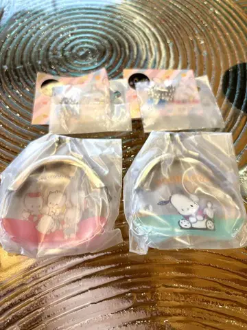 산리오 복주머니 키링 냐니뉴녜뇽 포차코 2개 세트