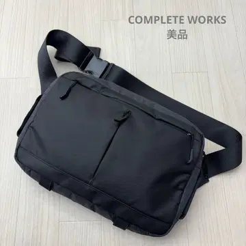 새상품급 컴플리트웍스 슬링백 바디백 블랙