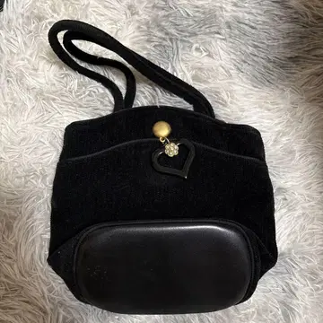 FILLER 블랙 코듀로이 핸드백