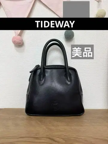 CHILD WOMAN 블랙 토트백 엠보싱 로고