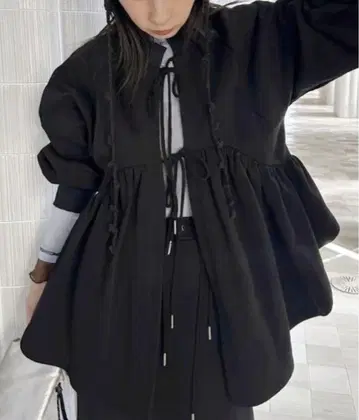 Ameri SYMMETRY PEPLUM SWEAT TOP