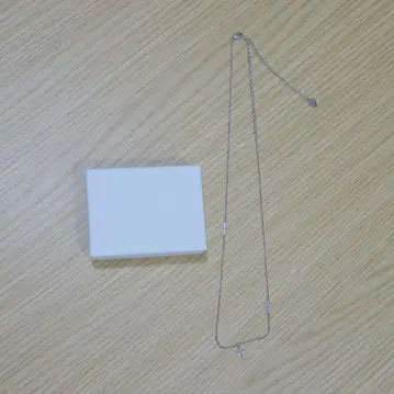 LAD MUSICIAN TRIPLE CROSS NECKLACE