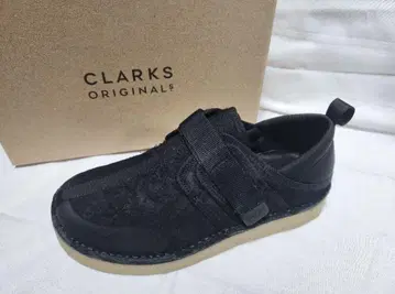 CLARKS ORIGINALS 블랙 슬립온 트렉 타이요