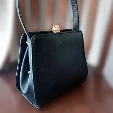 미러숀 블랙 핸드백