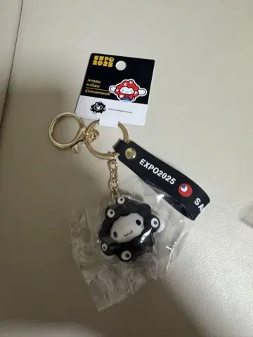 시나몬 롤 오사카 만박 산리오 블랙 미야쿠미야쿠 변신 키링
