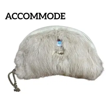 ACCOMMODE 몬스터 클러치 백 아이보리