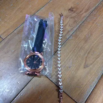 로즈 골드 시계 블랙 다이얼
