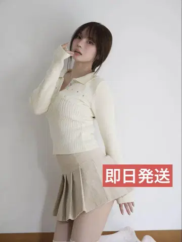 andmary Lindsay logo tops ivory