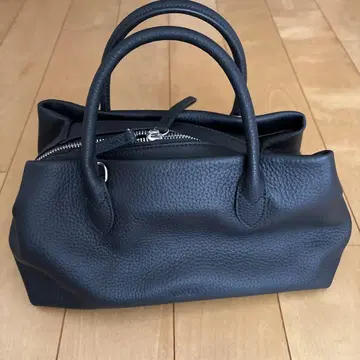 BRIC'S 블랙 가죽 핸드백