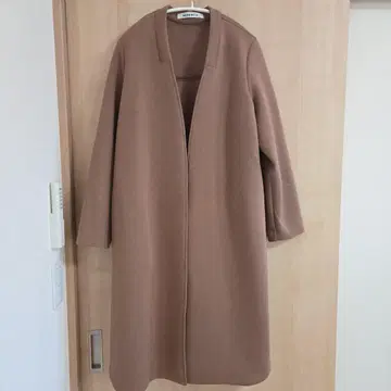 HERENCIA 헤렌시아 백산 프릴 본딩 코트 브라운