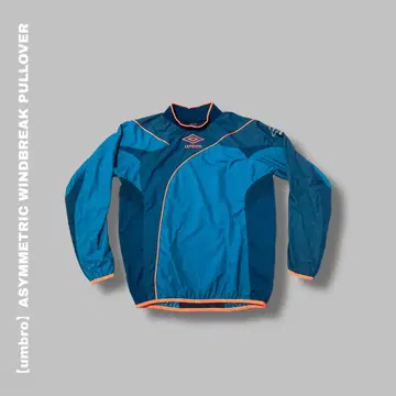 [ umbro ] ASYMMETRIC WINDBREAKER 3031T