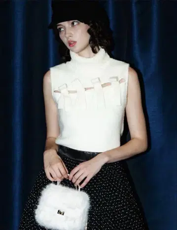 sheller sleeve less ribbon slit knit