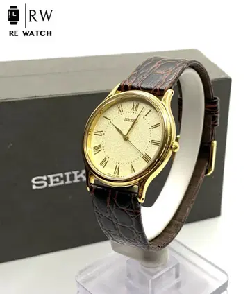 R7-3753 SEIKO 5E31-6040 쿼츠 골드/브라운
