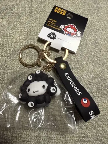 간사이 엑스포 미야쿠미야쿠 산리오 키링 블랙 변신 시나몬 롤