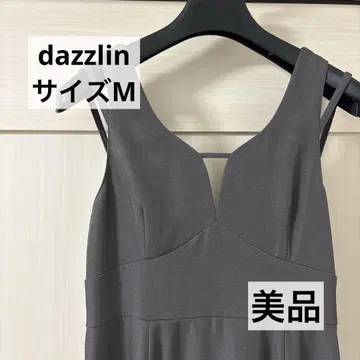 dazzlin 다즐린 스트링 디자인 언밸런스 헴 점프 스커트