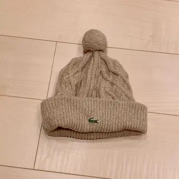 LACOSTE 케이블 짜임 니트 모자 베이지