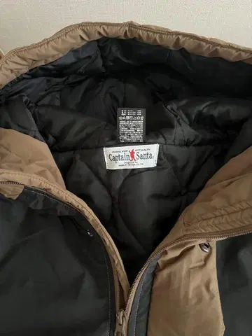Captain Santa 다운 자켓 XL