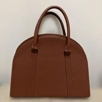 브라운 가죽 핸드백 원형