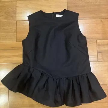 HEVE 발레리나 프릴 밑단 블랙 슬리브리스 튜닉 F