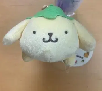 강아지 모양 봉제 인형 그린 컬러 잎 포함