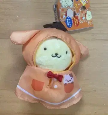 후드 부착 오렌지 봉제 인형