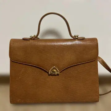 ungaro 브라운 핸드백 금장 장식 포함