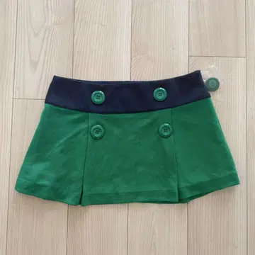 green & navy skirt with button details