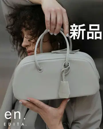 Edita 하프문 보스턴 백 en 라이트 그레이