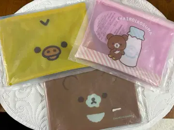 갈색 아기 곰 비닐 파우치 San-X 노란 새 리락쿠마