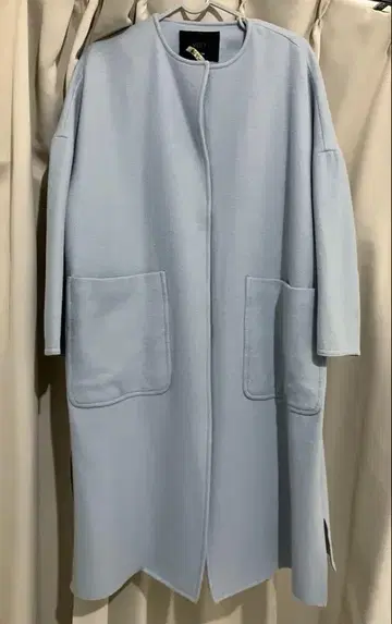 울 노카라 롱 코트