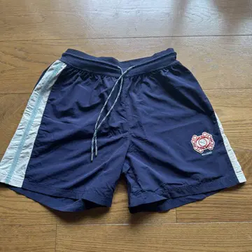 PUMA PALOMO 네이비 숏팬츠