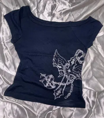 9090girl cross logo