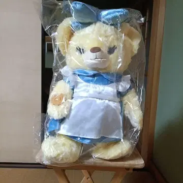 옐로우 컬러 봉제 인형 파랑 드레스
