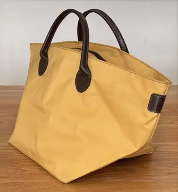 Eerve Chapelier 양털 택 핸들 가죽 나일론 보트형 토트백