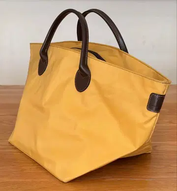 Eerve Chapelier 양털 택 핸들 가죽 나일론 보트형 토트백