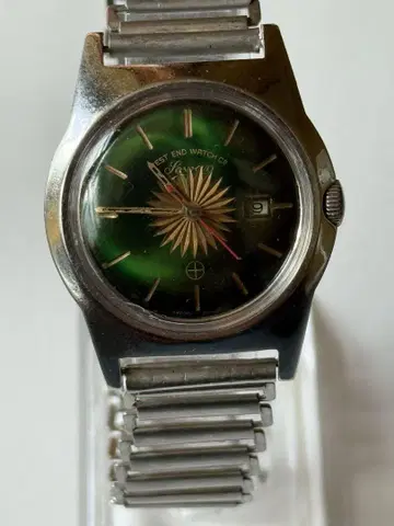 웨스트 엔드 소와 그린 다이얼 34.2mm